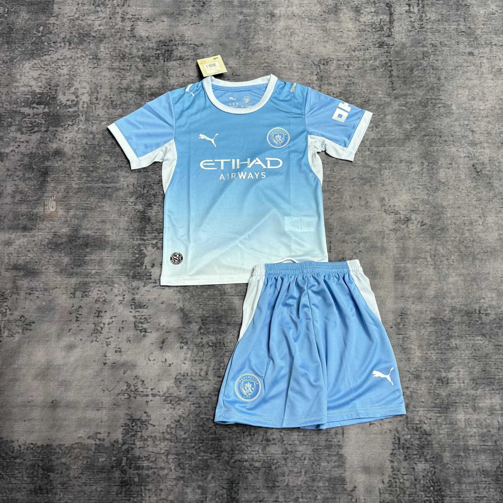 Kit Infantil Manchester City 26/27 Casa — Manchester City
