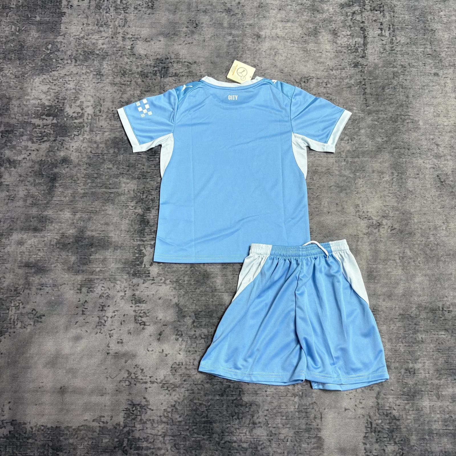 Kit Infantil Manchester City 26/27 Casa — Manchester City (foto 4)